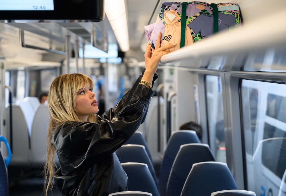 Lugging bag on train